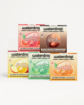 مجموعة عبوات Waterdrop للمشروبات مع أكياس ملونة مرتبة في صفوف مزدوجة.
